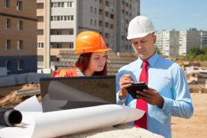 Two people at a construction side